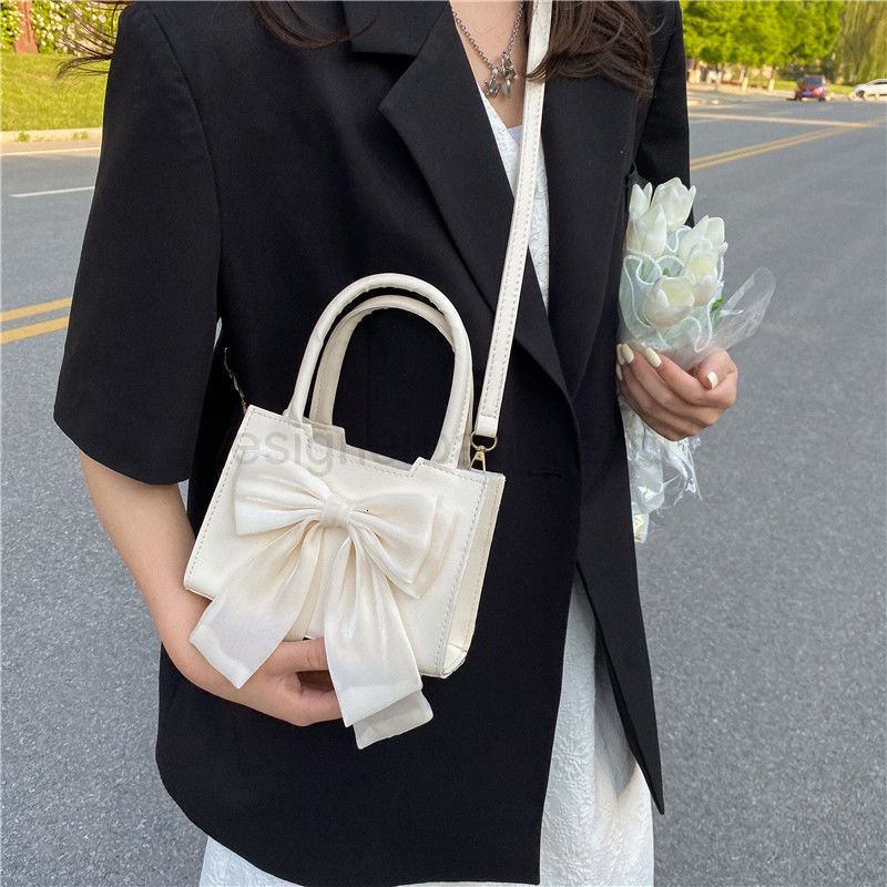 Bag Designer Fashion Classic 10a Top Nikiduncks Woman Handbagevening Bags 2024 New Korean Style Ins Trendy Fairy Bow Versatile Crossbod