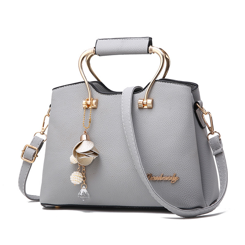 Designer's new atmosphere handheld women's large single shoulder multifunctional crossbody bag, fashionable and fashionable bag
