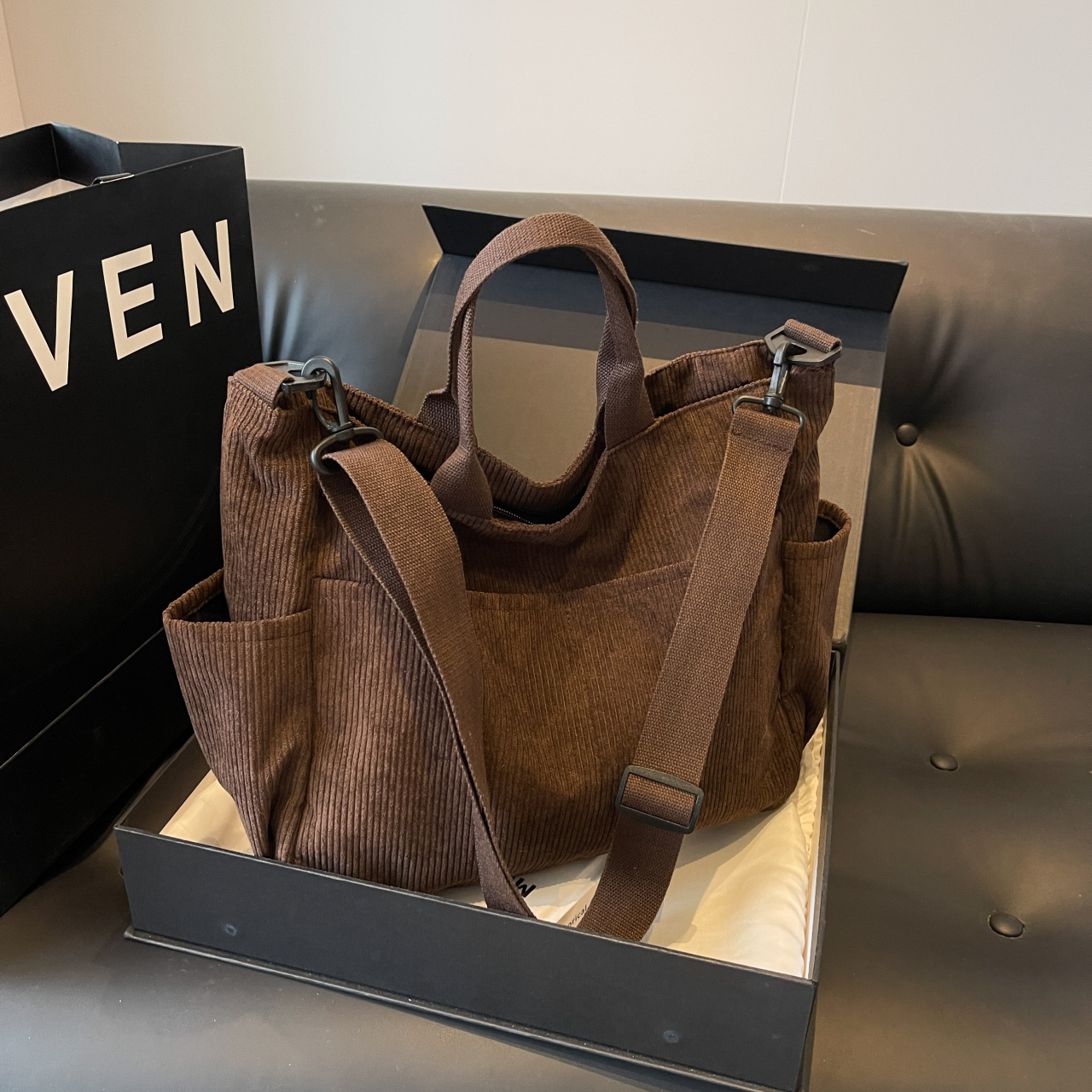 Multi Pocket Corduroy Handbag Large Capacity Casual Designer Backpack Suitable For Outdoor Travel Commuting And Work.