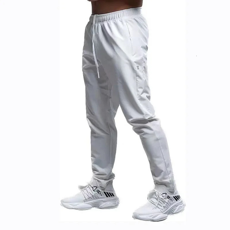 Breathable Loose Running Pants Men Autumn Winter Sport Training Gym Sportswear Elastic Waterproof Outdoor Zip Pocket Sweatpant 241104
