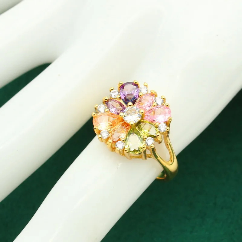 Classic 925 silver gold jewelry set suitable for womens weddings multi colored zircon bracelets earrings necklaces rings 4 pieces 241106