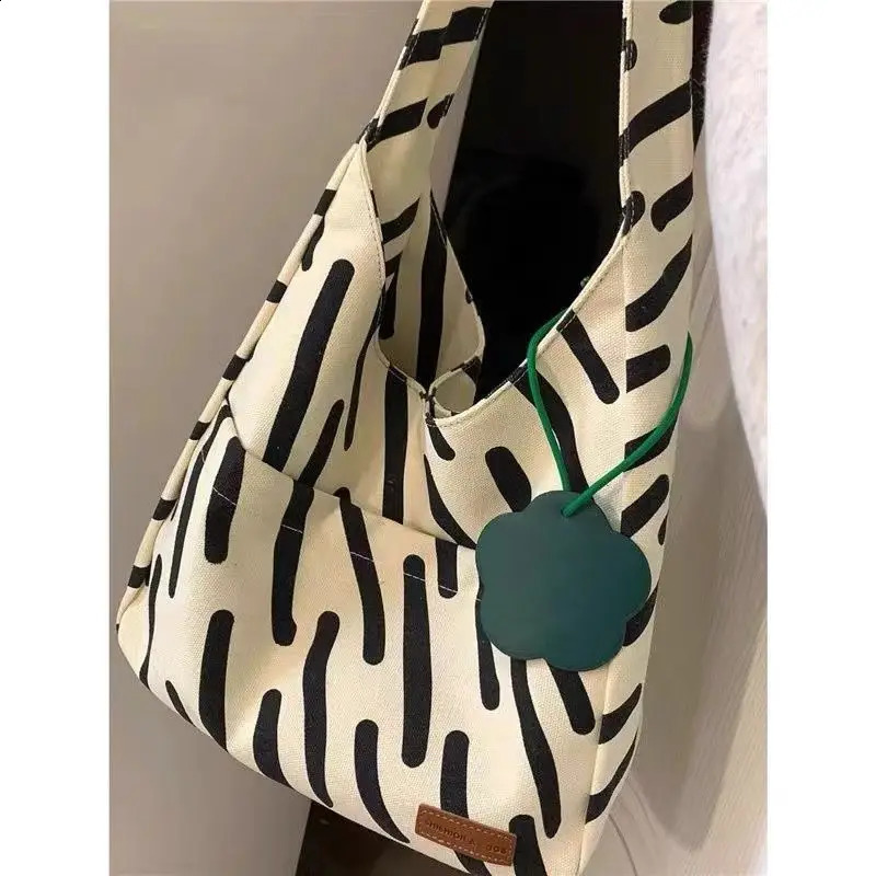 Small and high-end zebra patterned canvas womens large capacity handbag student grade shoulder bag womens handbag 241105