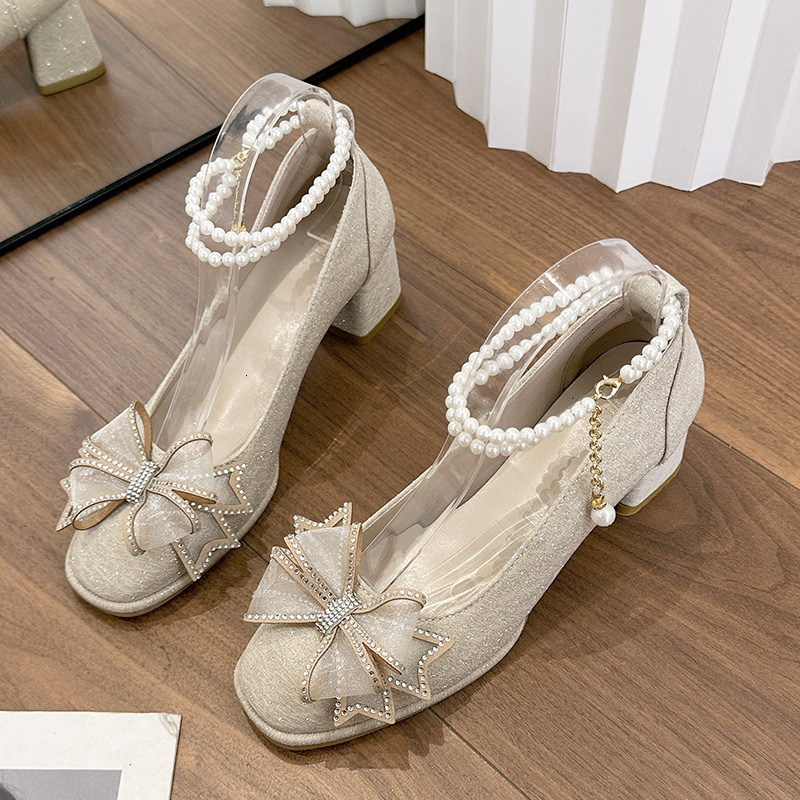 Elegant High-Heeled Footwear for Ladies Featuring a Beaded Bow Detail