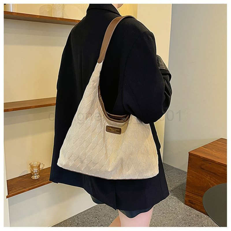 Fashion Classic Bag Designer 10a Top Nikiduncks Woman Handbagevening Bags 2024 Springsummer New Trendy Canvas Single Shoulder Tote Sim