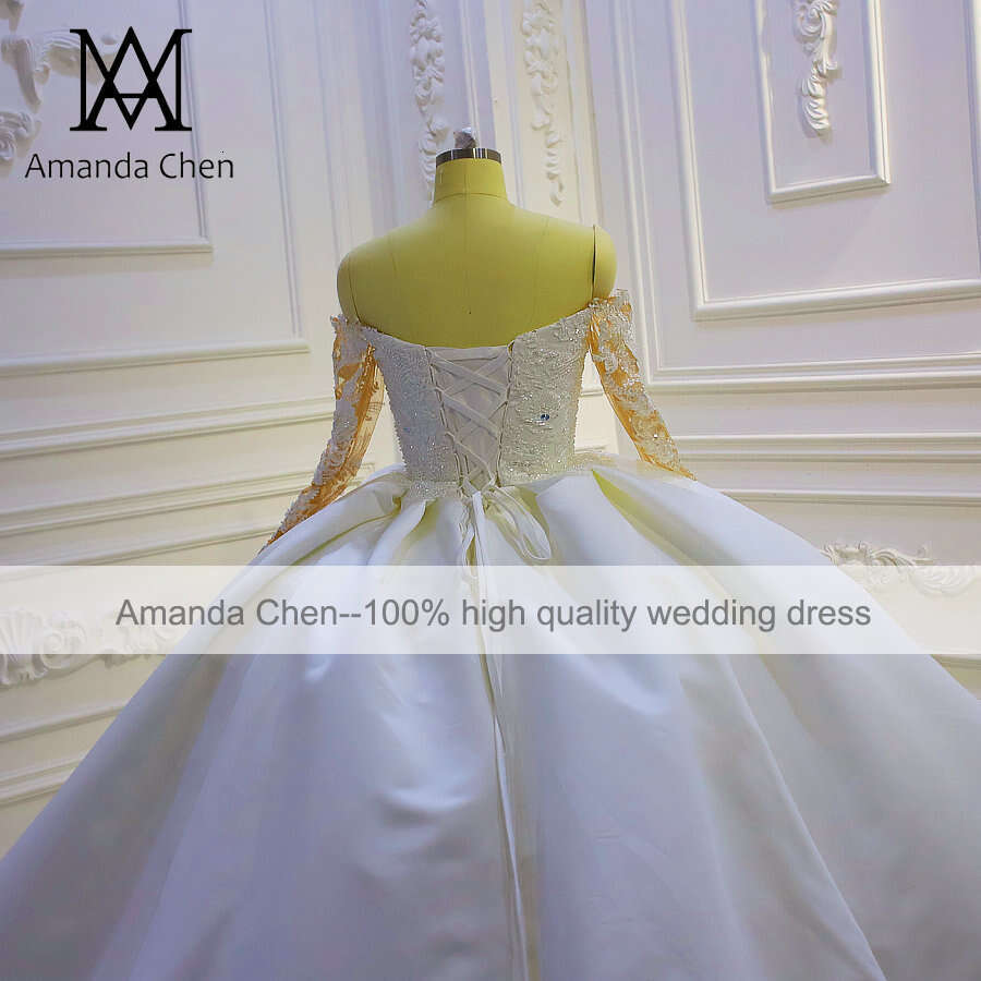 Off Shoulder Long Sleeve Ball Gown Tiered Skirts Wedding Dress