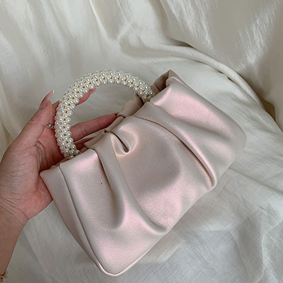 2025NEW New designer s high end French Bailing pearl handbag with a soft and trend fashion sloping body women s cloud bag fashionable bag