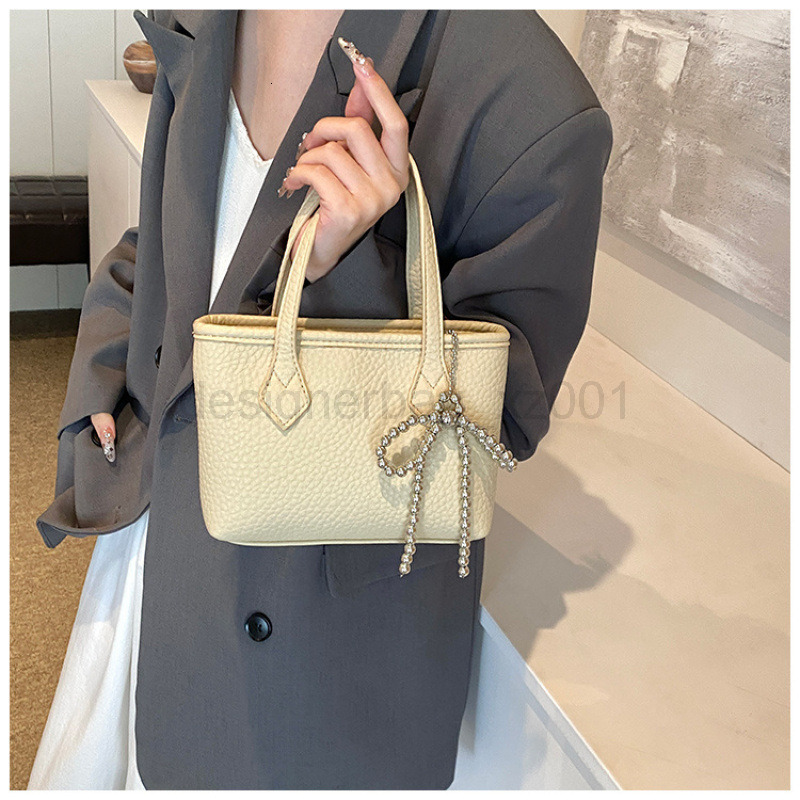 Bag Designer Fashion Classic 10a Top Nikiduncks Woman Handbagevening Bags New Fashionable and Versatile Style Butterfly Bow Bucket Sin