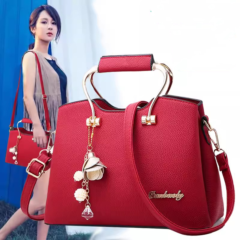 Designer's new atmosphere handheld women's large single shoulder multifunctional crossbody bag, fashionable and fashionable bag