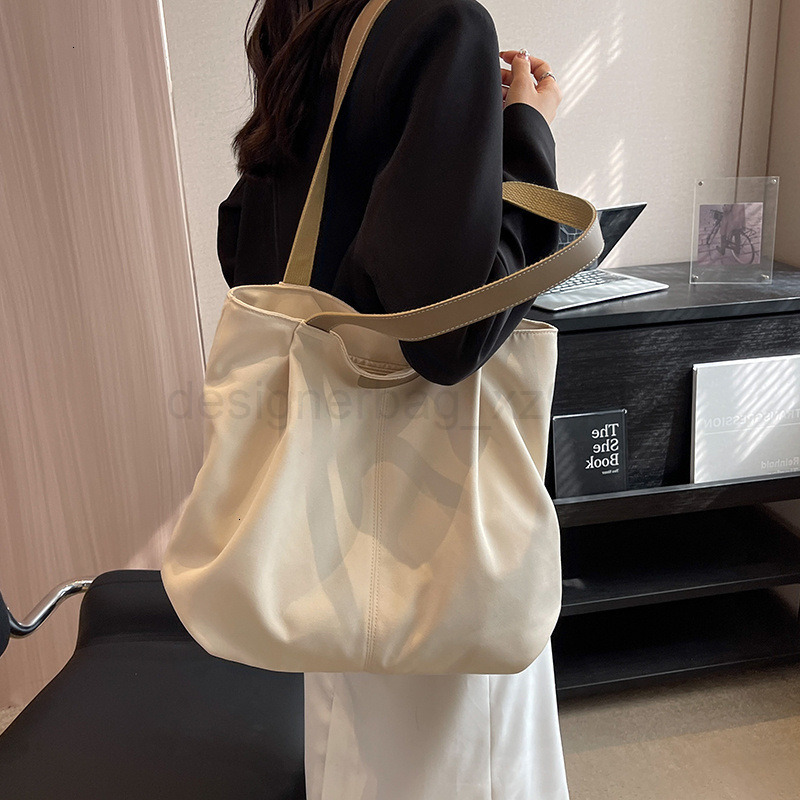 Classic Designer Bag Fashion 10a Top Nikiduncks Woman Handbagevening Bags Canvas Womens Large Capacity 2024 New Summer Versatile Singl