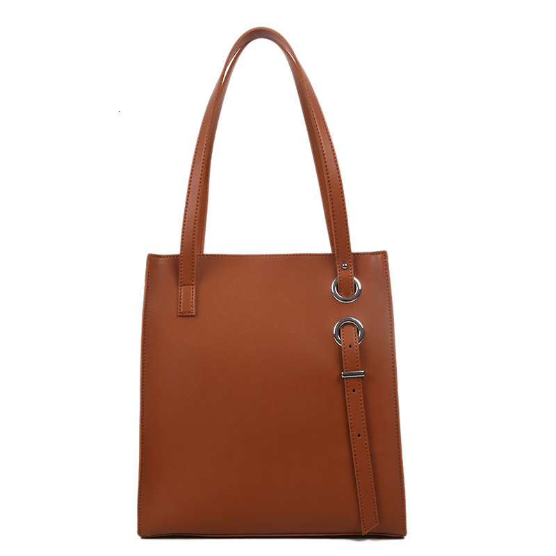 Designer's new large capacity bucket solid color shoulder bag Korean version shoulder bag women's fashion bag