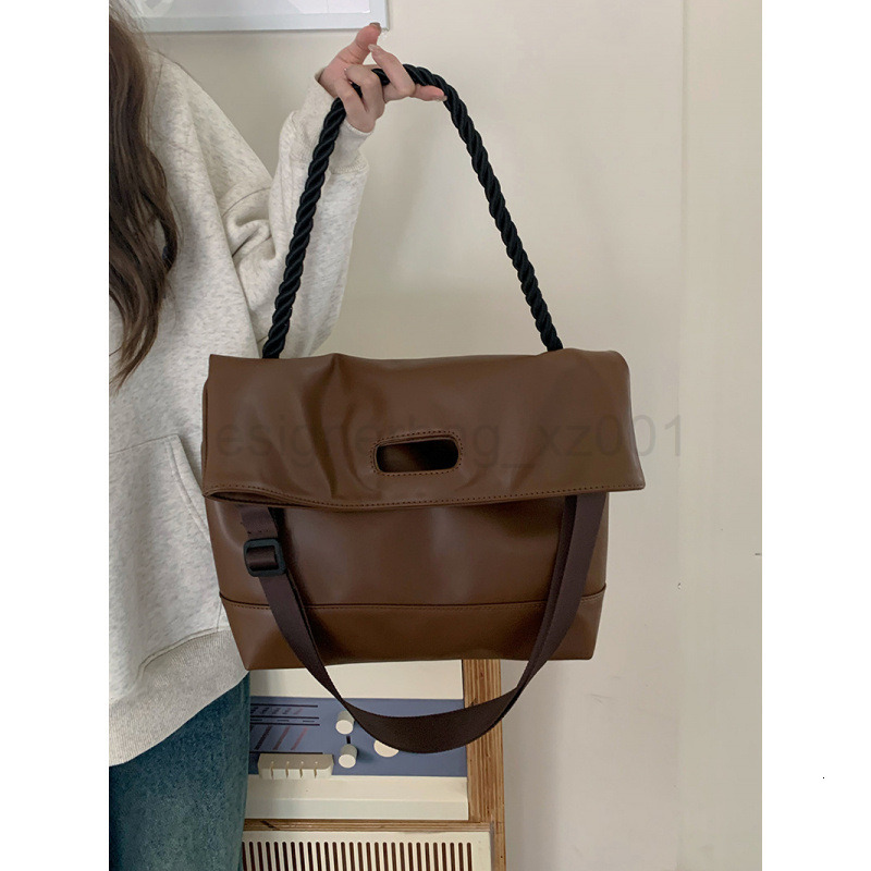 Fashion Classic Bag Designer 10a Top Nikiduncks Woman Handbagevening Bags Simple Soft Leather Commuting Tote with Design Crossbody 202