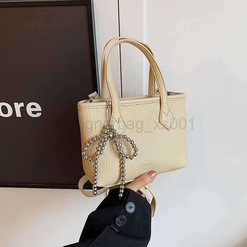 Bag Designer Fashion Classic 10a Top Nikiduncks Woman Handbagevening Bags New Fashionable and Versatile Style Butterfly Bow Bucket Sin