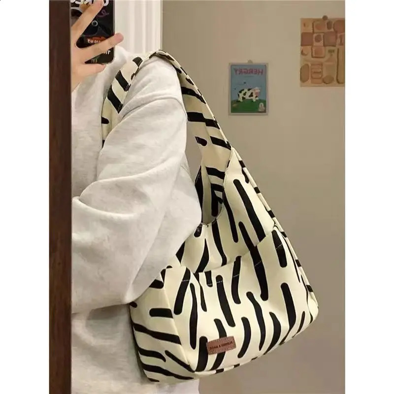 Small and high-end zebra patterned canvas womens large capacity handbag student grade shoulder bag womens handbag 241105