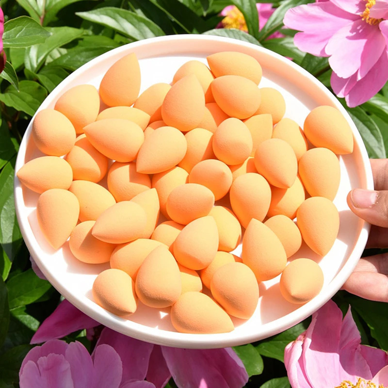 Wholesale 100 pieces of mini cosmetic sponge small cosmetic egg cosmetic powder puff basic cream concealer cosmetic mixer tools 241105
