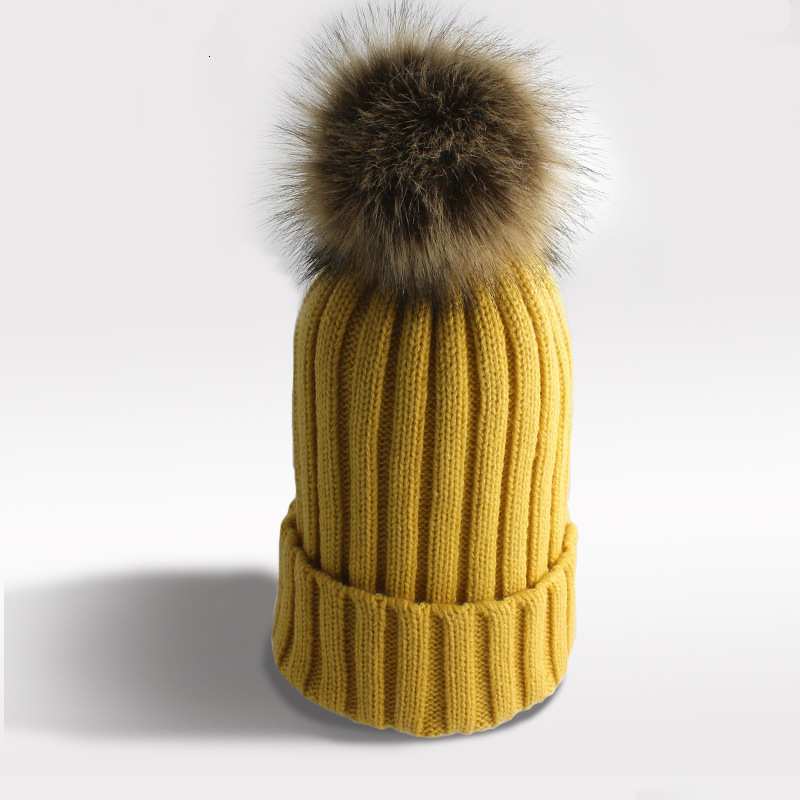 High quality design, men and women Autumn and Winter Pullover Solid Color Striped Outdoor Warmth Wool Ball Button Ear Protection Knitted Hat