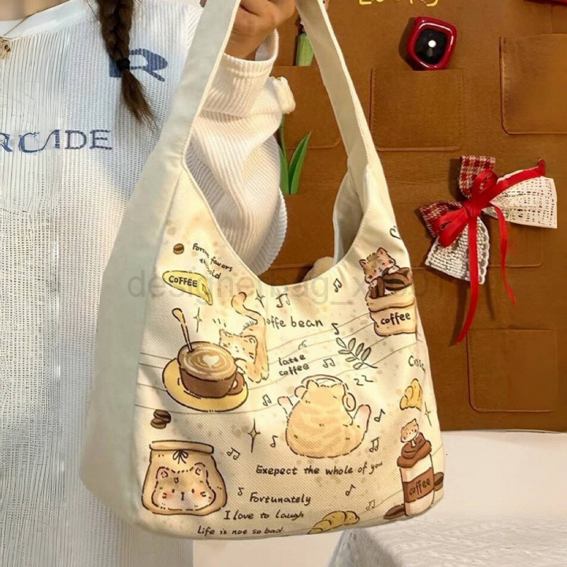 Fashion Classic Bag Designer 10a Top Nikiduncks Woman Handbagevening Bags 2024 New Kitten Shoulder Versatile Large Capacity Canvas Tot
