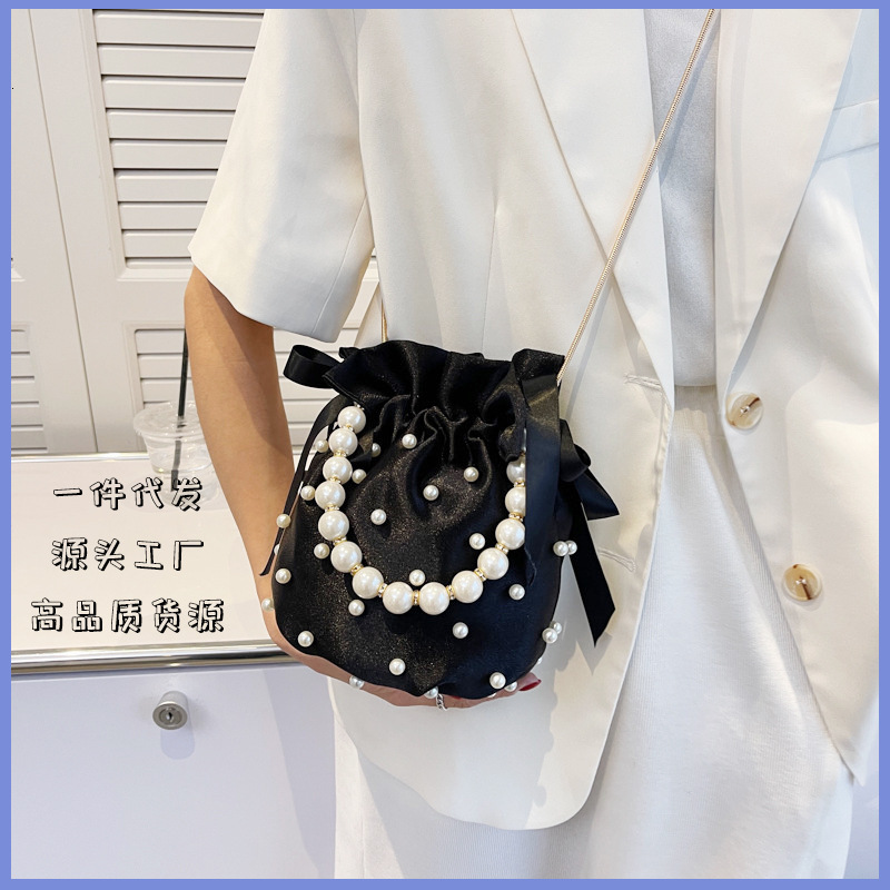 2025NEW Designer s new women s cross border fashion Instagram personalized Western style chain fashion bead fashion shoulder bag trend fashion bag