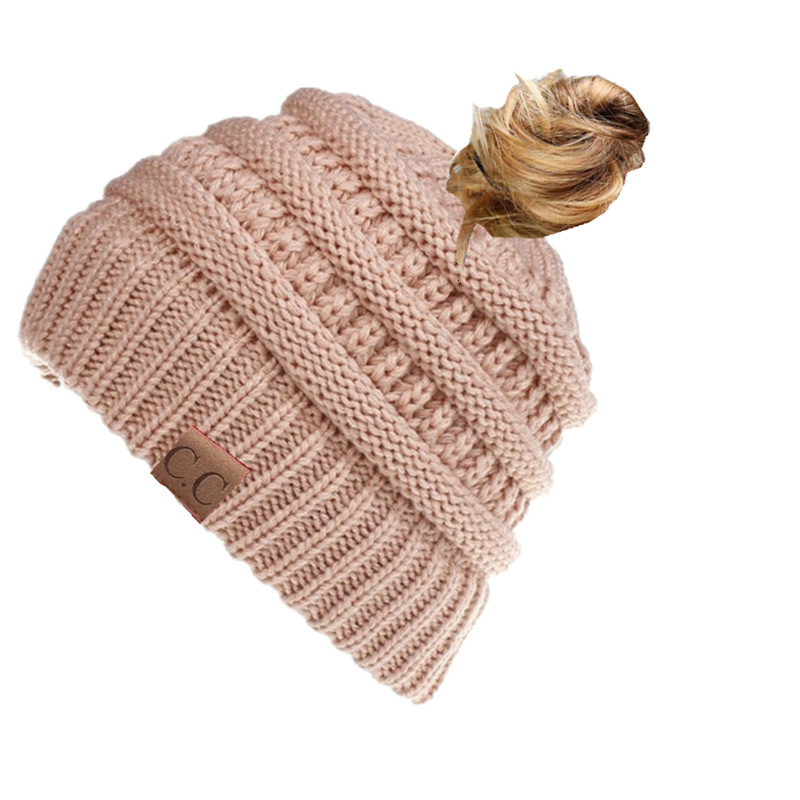 High quality design, men and women Autumn and winter knitted ear protection woolen ponytail hat