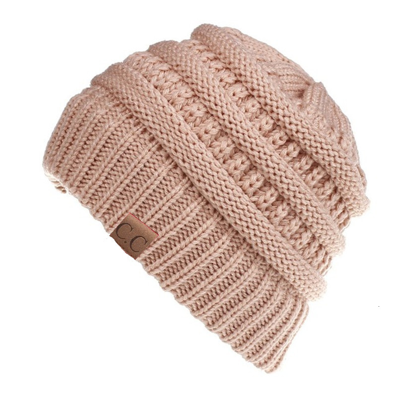 High quality design, men and women Autumn and winter knitted ear protection woolen ponytail hat