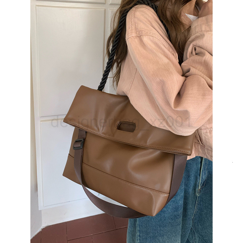 Fashion Classic Bag Designer 10a Top Nikiduncks Woman Handbagevening Bags Simple Soft Leather Commuting Tote with Design Crossbody 202