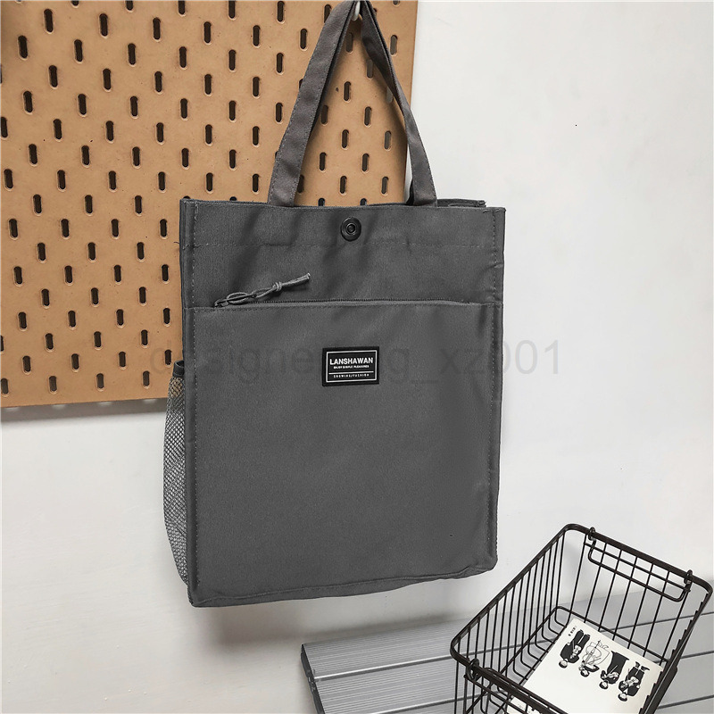 Classic Designer Bag Fashion 10a Top Nikiduncks Woman Mens Handbag Casual Simple Canvas Commuting Tote Shoulder Large Capacity File