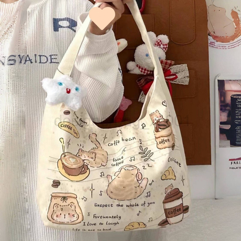 Fashion Classic Bag Designer 10a Top Nikiduncks Woman Handbagevening Bags 2024 New Kitten Shoulder Versatile Large Capacity Canvas Tot