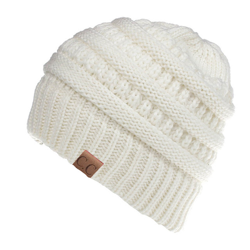 High quality design, men and women Autumn and winter knitted ear protection woolen ponytail hat