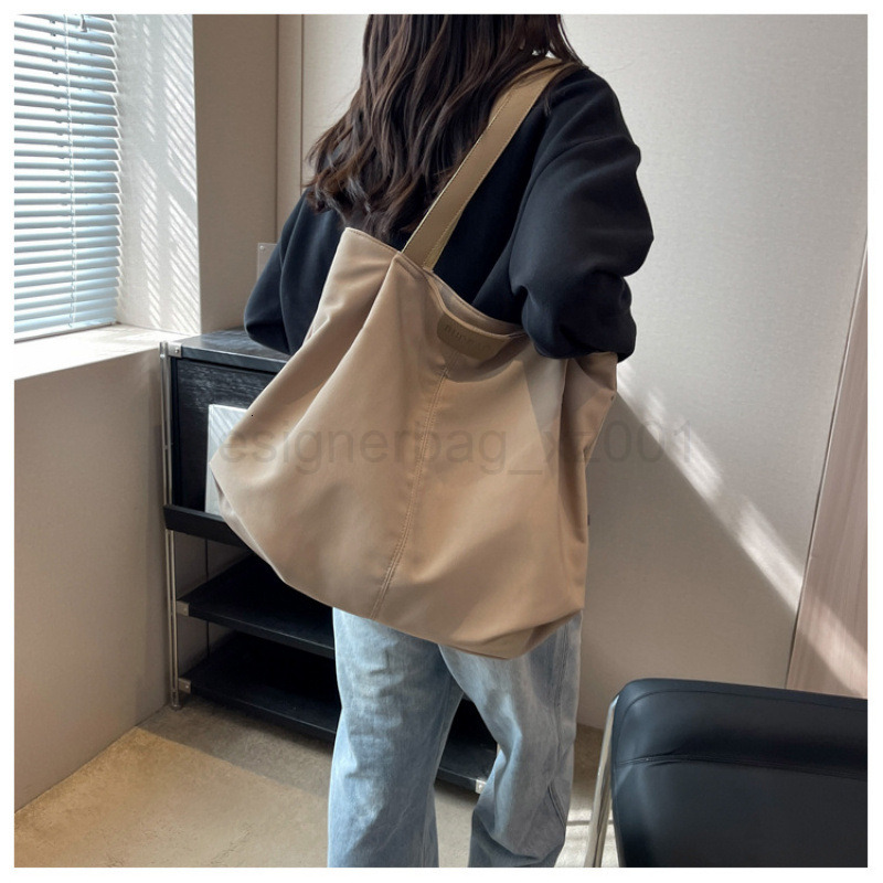 Classic Designer Bag Fashion 10a Top Nikiduncks Woman Handbagevening Bags Canvas Womens Large Capacity 2024 New Summer Versatile Singl