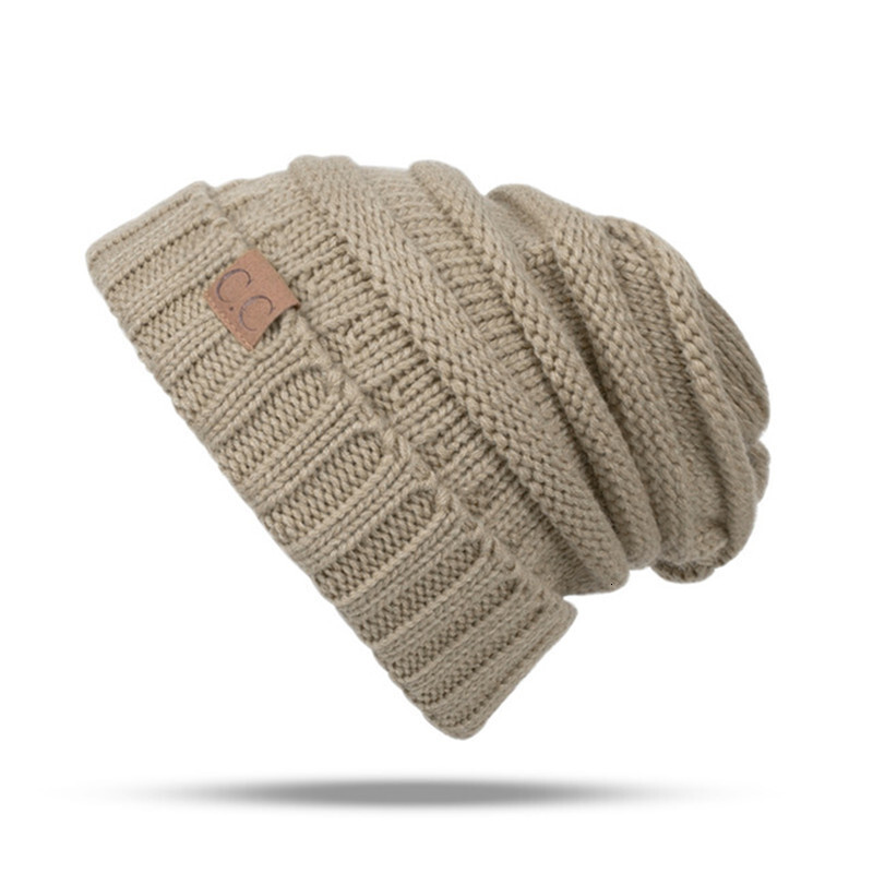 High quality design, men and women Autumn Winter New Knitted Pullover Warm Curled Edge Outdoor Cold Protection Hat