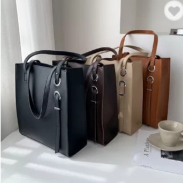 Designer's new large capacity bucket solid color shoulder bag Korean version shoulder bag women's fashion bag