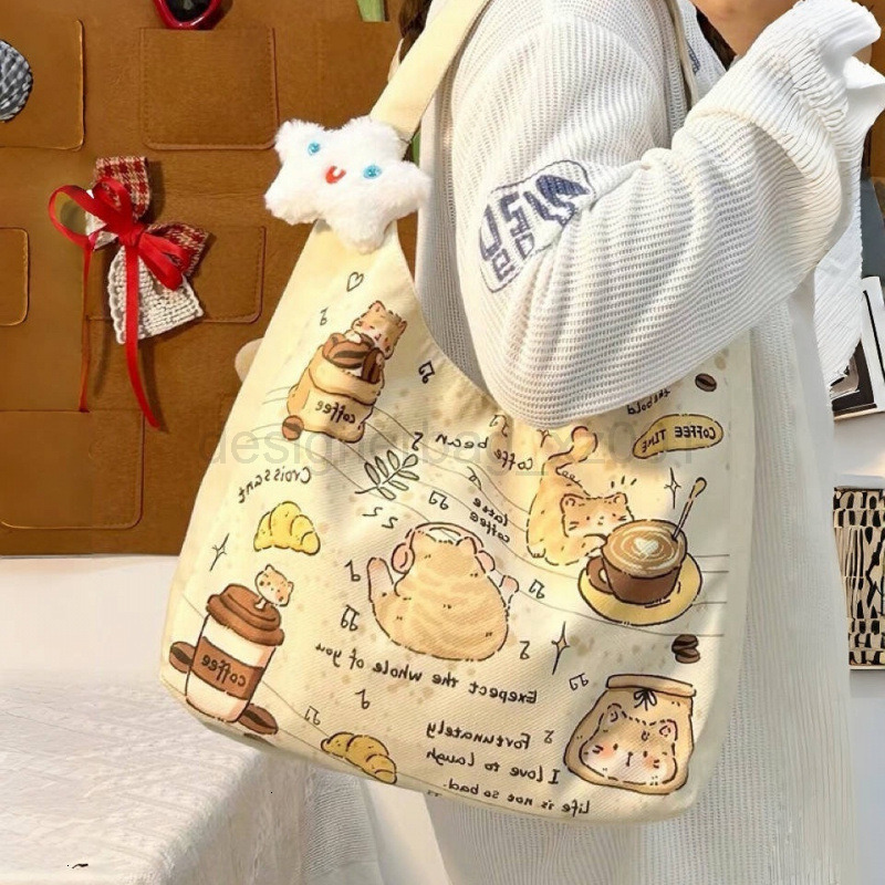 Fashion Classic Bag Designer 10a Top Nikiduncks Woman Handbagevening Bags 2024 New Kitten Shoulder Versatile Large Capacity Canvas Tot