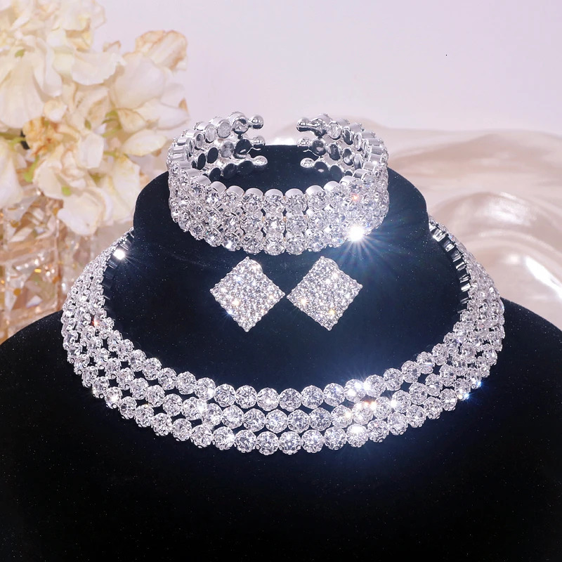 Classic rhinestone crystal necklace earring and bracelet set suitable for womens silver bridal wedding party jewelry set 241106