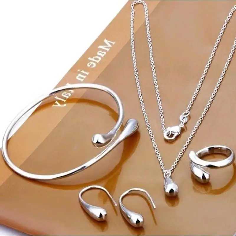 High quality 925 sterling silver water droplet earrings rings and bracelets set suitable for luxurious and elegant four piece jewelry set wedding gift