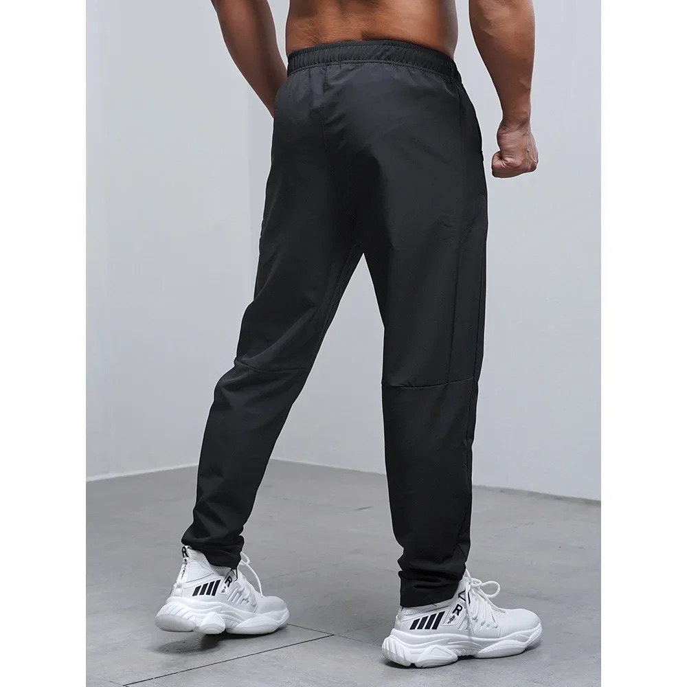 Breathable Loose Running Pants Men Autumn Winter Sport Training Gym Sportswear Elastic Waterproof Outdoor Zip Pocket Sweatpant 241104