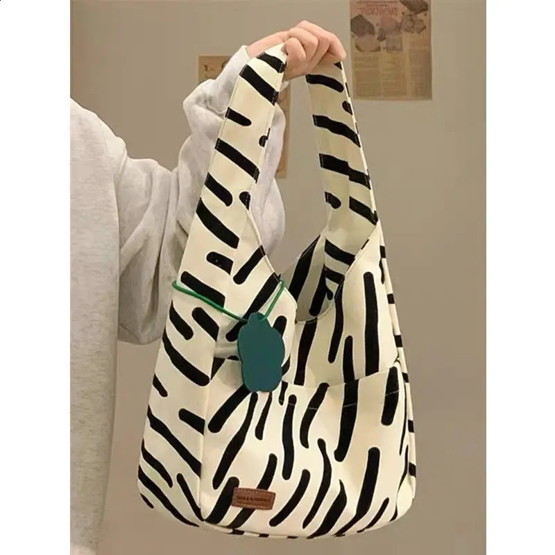 Small and high-end zebra patterned canvas womens large capacity handbag student grade shoulder bag womens handbag 241105