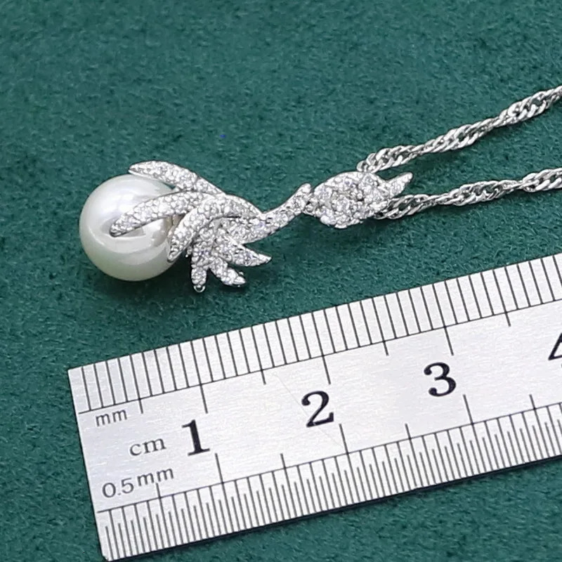 Charming white pearl 925 womens silver jewelry set zircon bracelet earrings necklace rings 241106