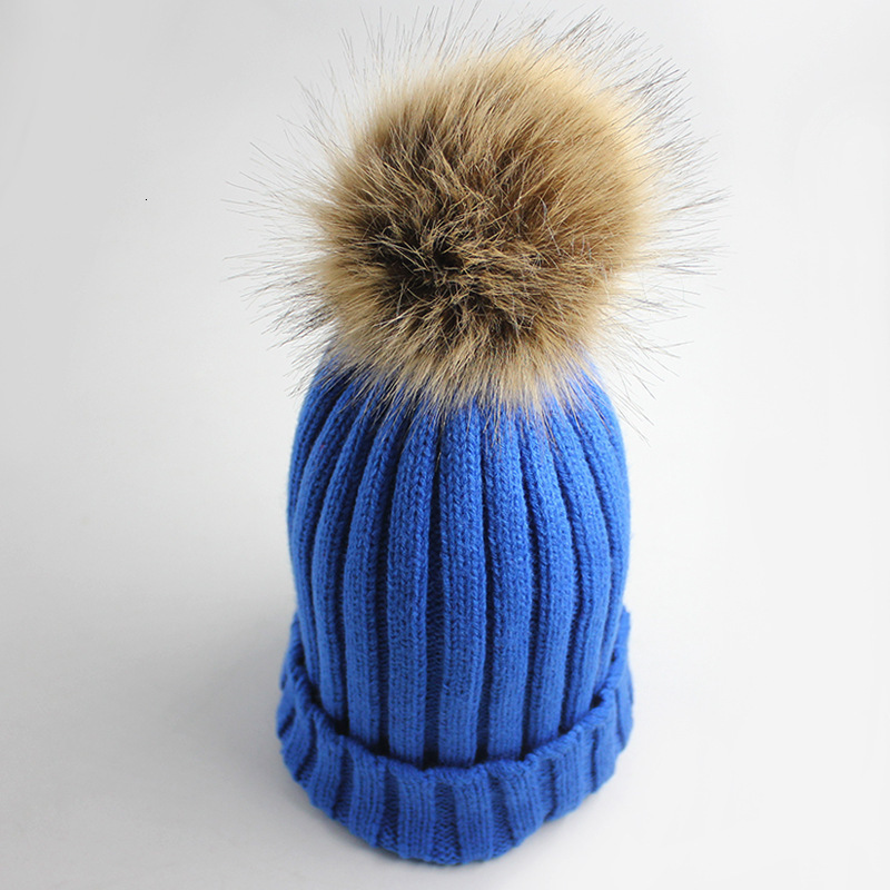 High quality design, men and women Autumn and Winter Pullover Solid Color Striped Outdoor Warmth Wool Ball Button Ear Protection Knitted Hat