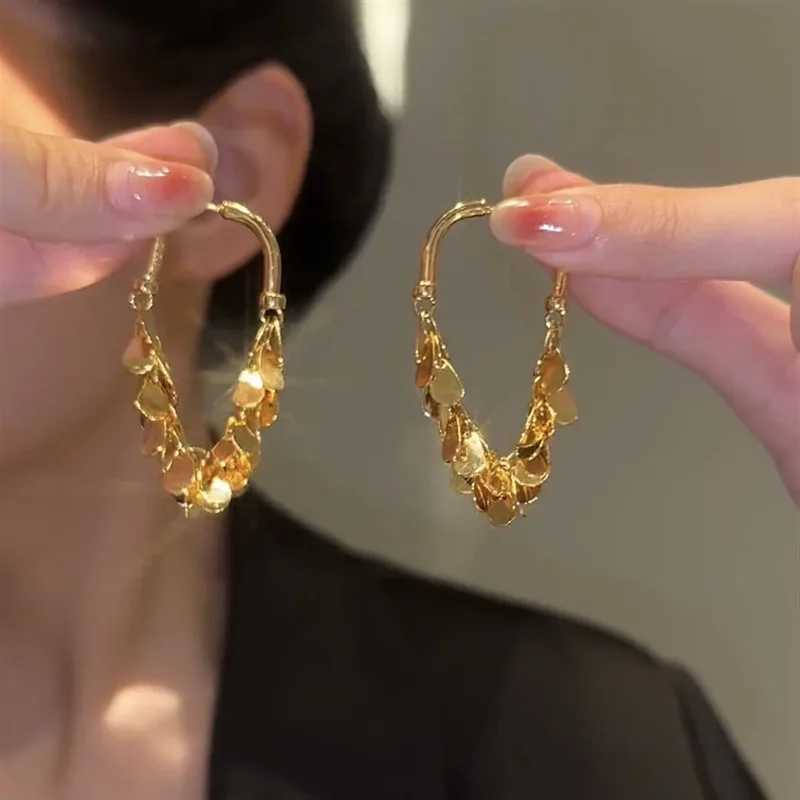 Retro solid color metal U-shaped tassel sequin earrings simple temperature drop shaped earrings unusual accessories for party girls X241106