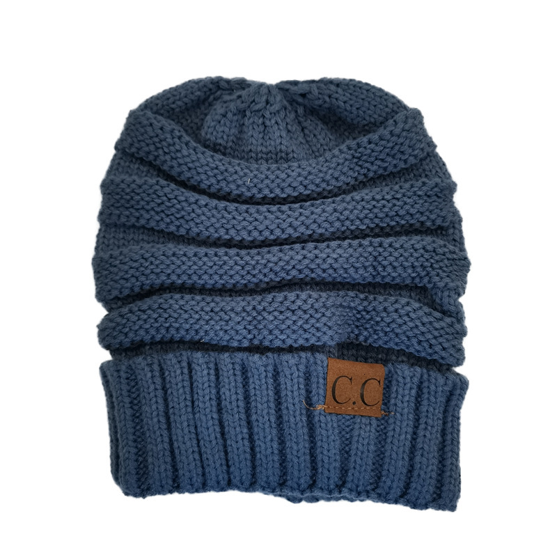 High quality design, men and women Autumn Winter New Knitted Pullover Warm Curled Edge Outdoor Cold Protection Hat