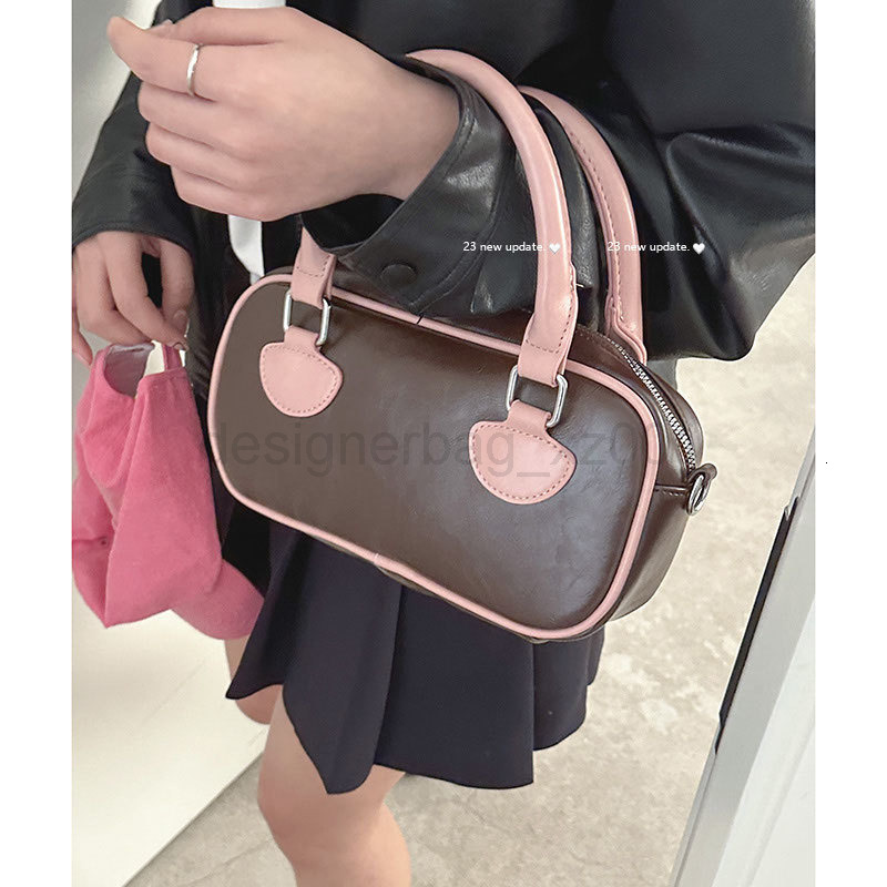 Fashion Classic Bag Designer 10a Top Nikiduncks Woman Handbagevening Bags Korean Niche Handheld for Women 2024 New Trendy and Fashionab