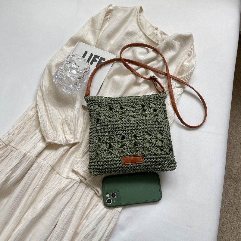 A leisure pure color straw woven bag women's environmental protection woven bag advanced materials fine work holiday