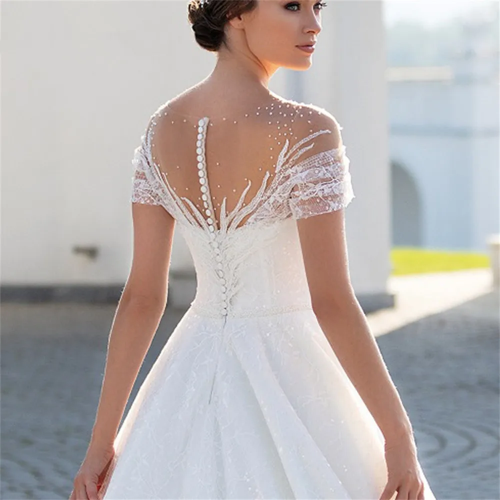 Modern A-Line Wedding Dresses Cape Sleeves V Neck Hollow Lace Appliqued Sequins Floor Length Hollow Backless Shiiny Tulle Lace Plus Size Boho Wedding 