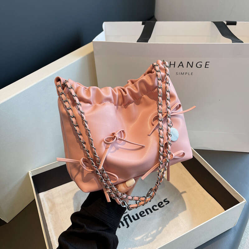 French niche pleated design portable small for women 2023 new summer minimalist bucket fashion crossbody bag