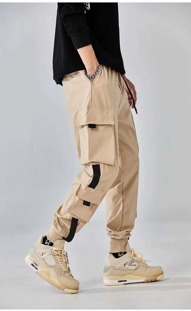 Classic Design Multi Flap Pockets Cargo PantsMens Loose Fit Drawstring Harem Cargo Jogger Pants LX241107