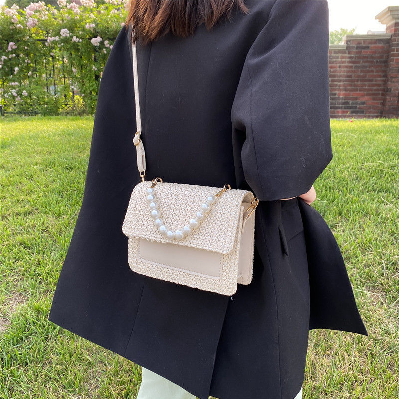 2023 New Summer Fashion Pearl Minimalist Western Style Crossbody Minimalist Ins Straw Woven Handbag