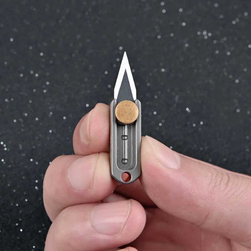 Pure titanium mini push knife titanium alloy sharp portable Edc keychain pendant quick opening upon unboxing X241107