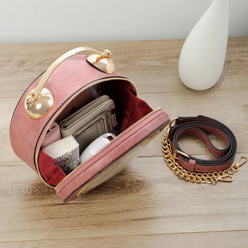 Modeling Of Small Round Bell With Individual Chain In The New Kind Of Women's Bag Hand-held Slant Bag Clock Bag In