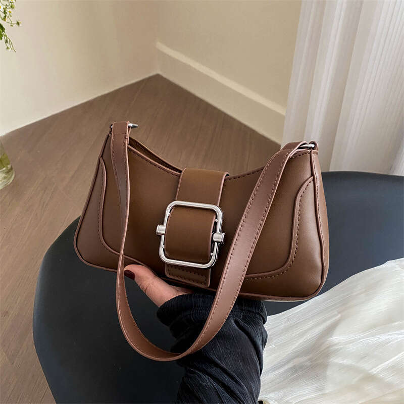 Simple and trendy belt buckle design 2024 new women's fashionable single shoulder armpit simple crossbody bag