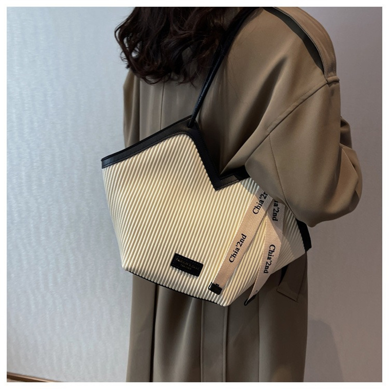 New Design Fashion Stripped Women's Shoulder Bags Tote Bag Korean Style Solid Color Bucket for Student Autumn New Handbags 2024