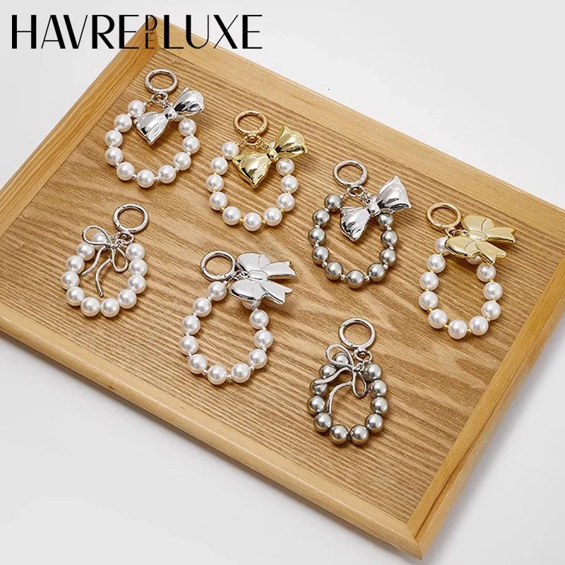 Korean exquisite pearl bow keychain pearl phone bag handmade keychain jewelry decoration fashion gift accessories 241107